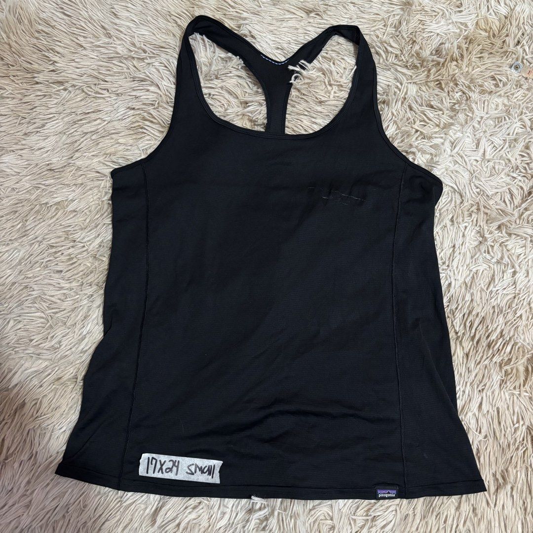 Patagonia running singlet (Category: Activewear) located in Cavite. Submitted by sportswearaftermarket (Listing ID 1452868335, Image 1). Description: Patagonia running singlet Size small Issue: paint stain removable Kawit cavite location Shipped through lalamove and jnt.