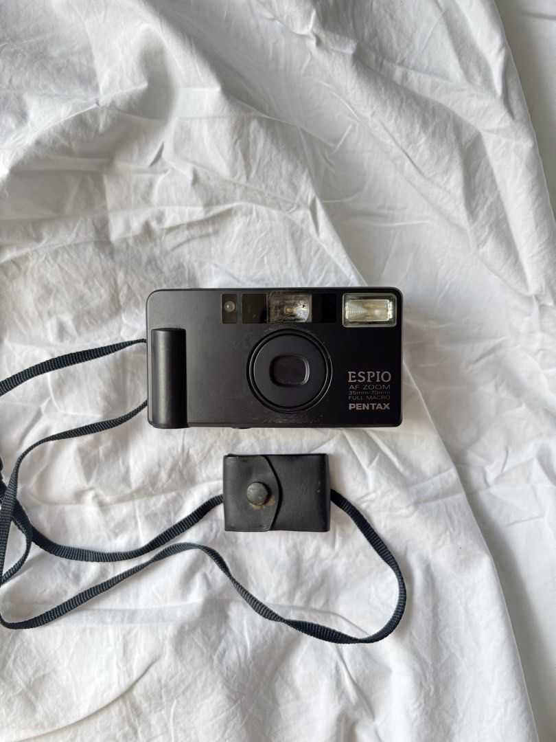 Pentax Espio AF Zoom Full Macro Film Camera (Category: Cameras) located in Pasig City. Submitted by parall3lles3m (Listing ID 1452703643, Image 1). Description: Pentax Espio AF Zoom 35mm film camera Battery: CR123A Flash working With signs of use - scratches on flash and viewfinder (external) Inclusions: Original pouch.