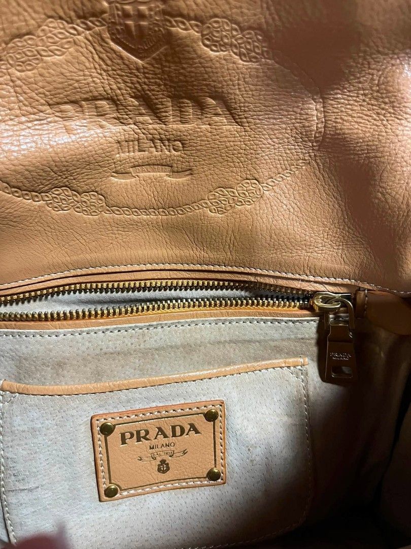 PRADA CANAPA SHOULDER/HAND BAG (Category: Luxury Bags & Wallets) located in Caloocan City. Submitted by allgoodsthrifts (Listing ID 1452814638, Image 3). Description: PRADA CANAPA SHOULDER/HAND BAG -Authentic 💯 (Posted also at Vestiare App) -Missing sling trap -Lampo underzip -Needs wash only -Good Condition Makati City loc..