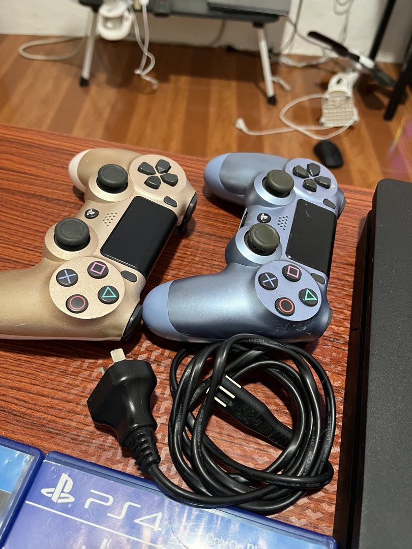 PS4 Console with 2 Controllers and 3 Games (Category: PlayStation) located in Manila. Submitted by classiqueph (Listing ID 1452815777, Image 3). Description: - PlayStation 4 slim -500gb - Two DualShock 4 Controllers (1 Gold, 1 Blue) - Three Games Included: - Horizon Zero Dawn Complete Edition - Injustice 2 - The Witcher 3: Wild Hunt - All necessary cables included - Ready for immediate gaming!.