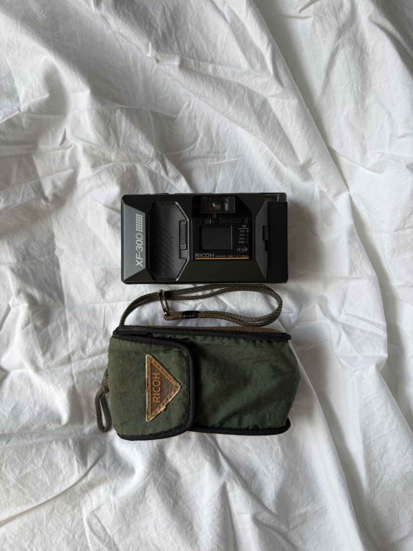 Ricoh XF 30D Film Camera (Category: Cameras) located in Pasig City. Submitted by parall3lles3m (Listing ID 1452704013, Image 1). Description: Ricoh XF 30D Film Camera 35mm film camera Comes with original pouch All functions working.