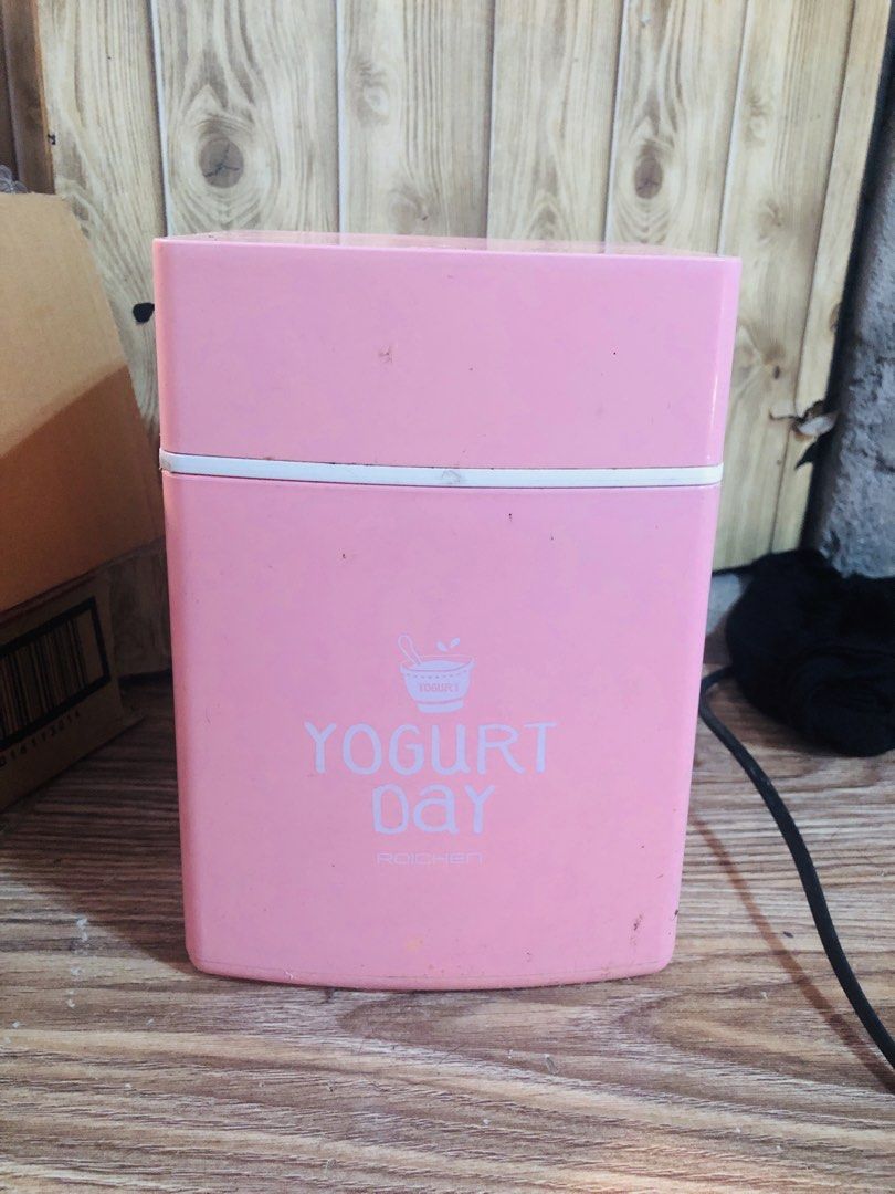 ROICHEN Yogurt Day Pink Yogurt Maker (Category: Other Kitchen Appliances) located in Manila. Submitted by noemiaspa1702 (Listing ID 1452877886, Image 1). Description: - Pink ROICHEN yogurt maker - 'YOGURT Day' design on front - White stripe accent around the middle - Perfect for homemade yogurt - Small and compact size.