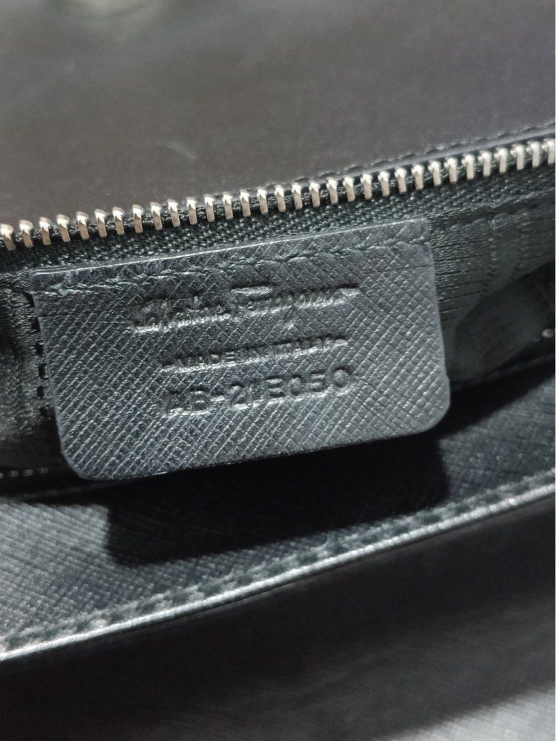 Salvatore Ferragamo leather shoulder bag (Category: Luxury Bags & Wallets) located in Manila. Submitted by adreamthrift27 (Listing ID 1452845298, Image 2). Description: “Salvatore Ferragamo” 2010’s Gancini leather shoulder bag Rank: A Height 19.5 cm, Width 29 cm, Depth 6.5 cm Shoulder strap 57 cm nego .