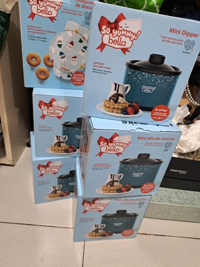 So Yummy Bella Mini Pot & Donut Maker Set (Category: Cookware & Accessories) located in Quezon City. Submitted by sbvdmanaog (Listing ID 1452873114, Image 1). Description: - Cute So Yummy Bella mini pot and donut maker set - Perfect for making mini donuts, dips, and more - Comes with over 100 exclusive recipes - Mini pot features a dishwasher-safe lid - Easy to use: plug and play - Makes 4 mini donuts at a time - Nonstick coating for easy cleanup