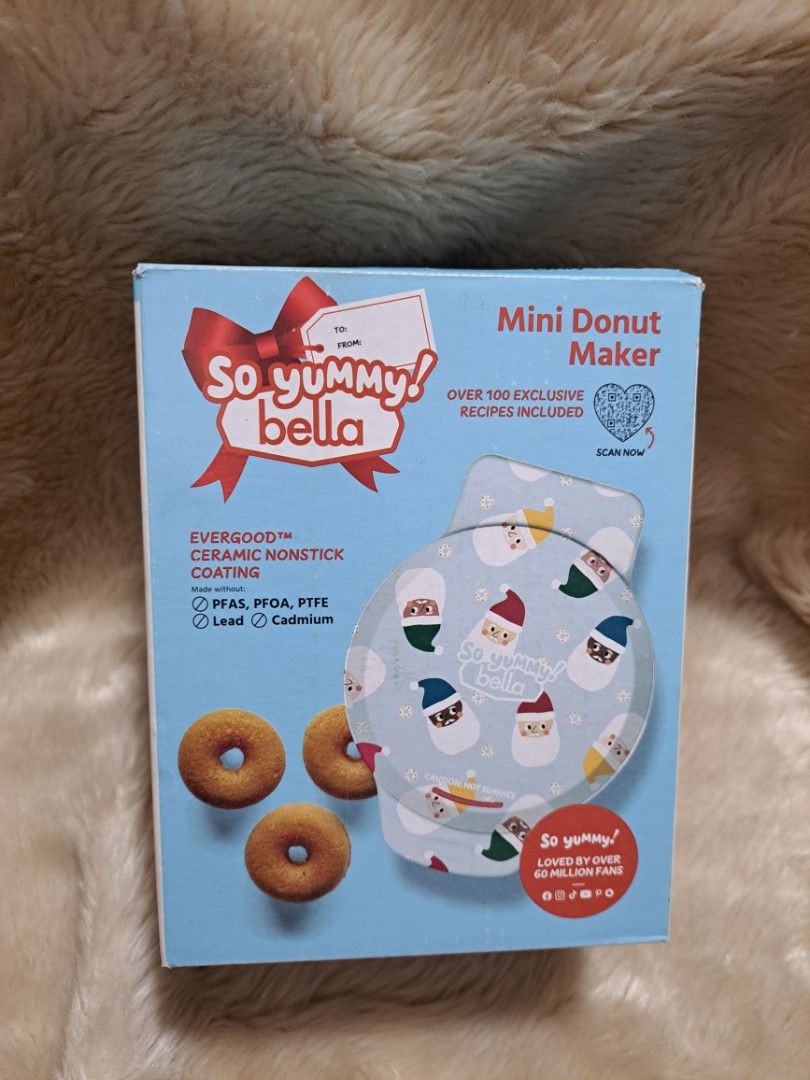 So Yummy Bella Mini Pot & Donut Maker Set (Category: Cookware & Accessories) located in Quezon City. Submitted by sbvdmanaog (Listing ID 1452873114, Image 2). Description: - Cute So Yummy Bella mini pot and donut maker set - Perfect for making mini donuts, dips, and more - Comes with over 100 exclusive recipes - Mini pot features a dishwasher-safe lid - Easy to use: plug and play - Makes 4 mini donuts at a time - Nonstick coating for easy cleanup