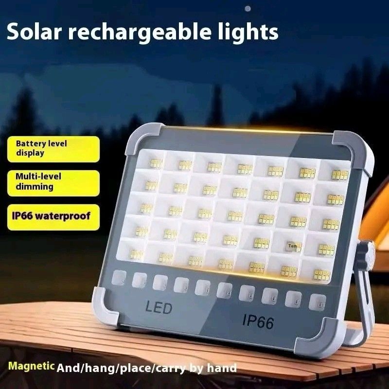 Solar Rechargeable LED Flood Light with Power Bank Function (Category: Lighting) located in Manila. Submitted by marvieobordo (Listing ID 1452824161, Image 2). Description: - Solar rechargeable LED flood light - Versatile mounting: Magnetic, hangable, or handheld - Features battery level display - Multi-level dimming for adjustable brightness - Functions as a power bank to charge other devices - IP66 waterproof rating for durability - Fast solar 