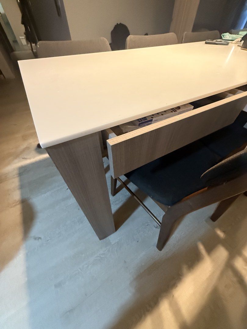 Solid surface dining table (Category: Tables & Sets) located in Singapore. Submitted by suchandsuch (Listing ID 1452877513, Image 3). Description: Solid surface dining table Length 176cm x width 75cm x 75cm height Hidden drawer built in *Viewing before purchase is possible, provided the timing works for both of us..