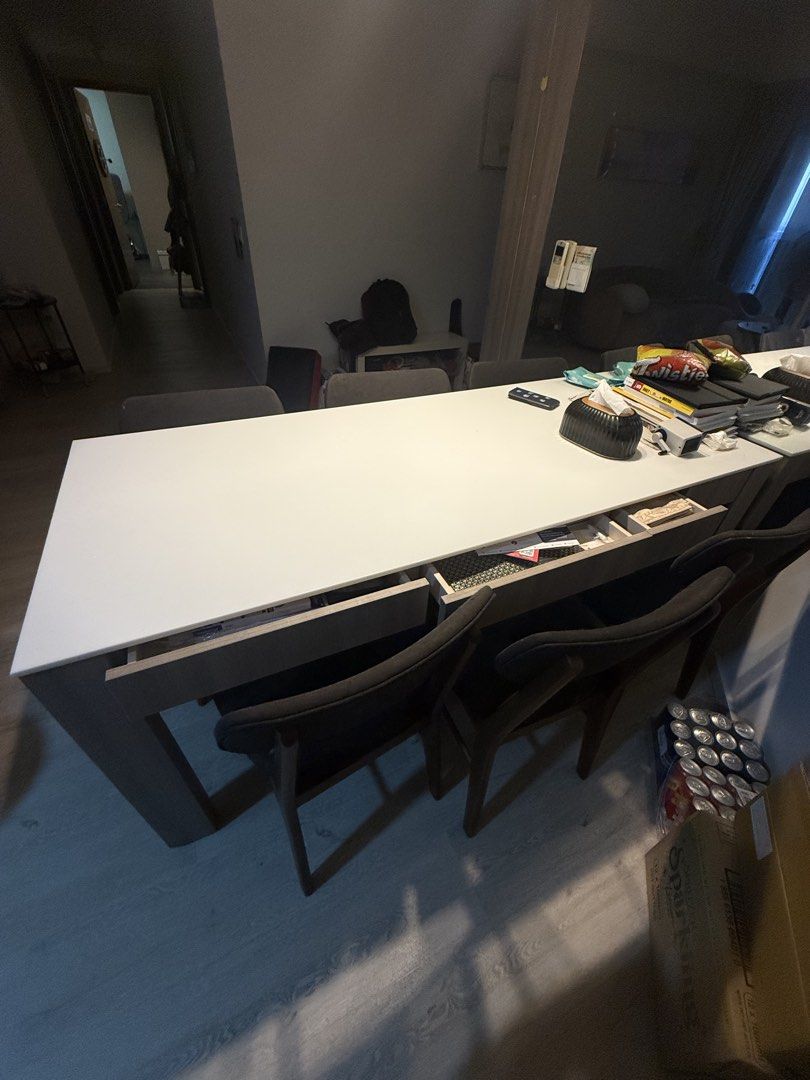 Solid surface dining table (Category: Tables & Sets) located in Singapore. Submitted by suchandsuch (Listing ID 1452877513, Image 1). Description: Solid surface dining table Length 176cm x width 75cm x 75cm height Hidden drawer built in *Viewing before purchase is possible, provided the timing works for both of us..