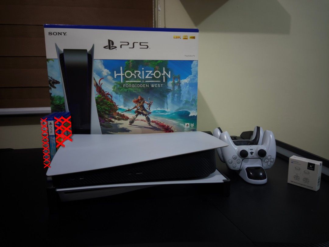 Sony PlayStation 5 (PS5) (Category: PlayStation) located in Bulacan. Submitted by jcswish (Listing ID 1400519802, Image 2). Description: AUTO PASS ON BUY AND SELLERS. PASS ON LOW BALL OFFERS PS5 Phat Comes with : 2 controllers (1 stock color, 1 all white color) 3 games - Red Dead Redemption 2, Star Wars Outlaws, Harvest Moon : The Winds Of Anthos 1 pc black horizontal stand 1 pc dobe dualshock charging dock 1 pair of brand new Gulikit TMR Joystic