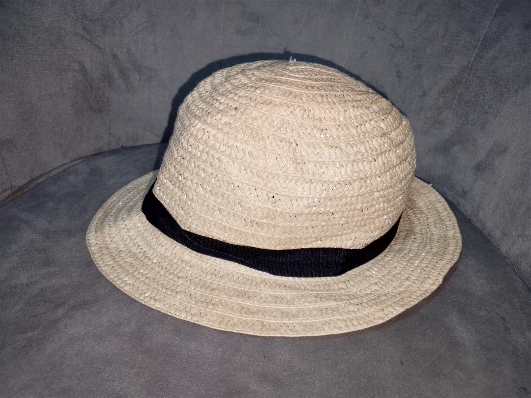 Straw Fedora Hat with Black Band (Category: Hats & Beanies) located in Binangonan. Submitted by yuristalin888 (Listing ID 1452861079, Image 2). Description: - Classic straw fedora hat - Woven straw material - Features a simple black band around the crown - Ideal for sunny days - Versatile style for casual outings or beach trips - Easy to pack and wear - FREE ON EVERY 2PCS CAPS PURCHASED!!!.