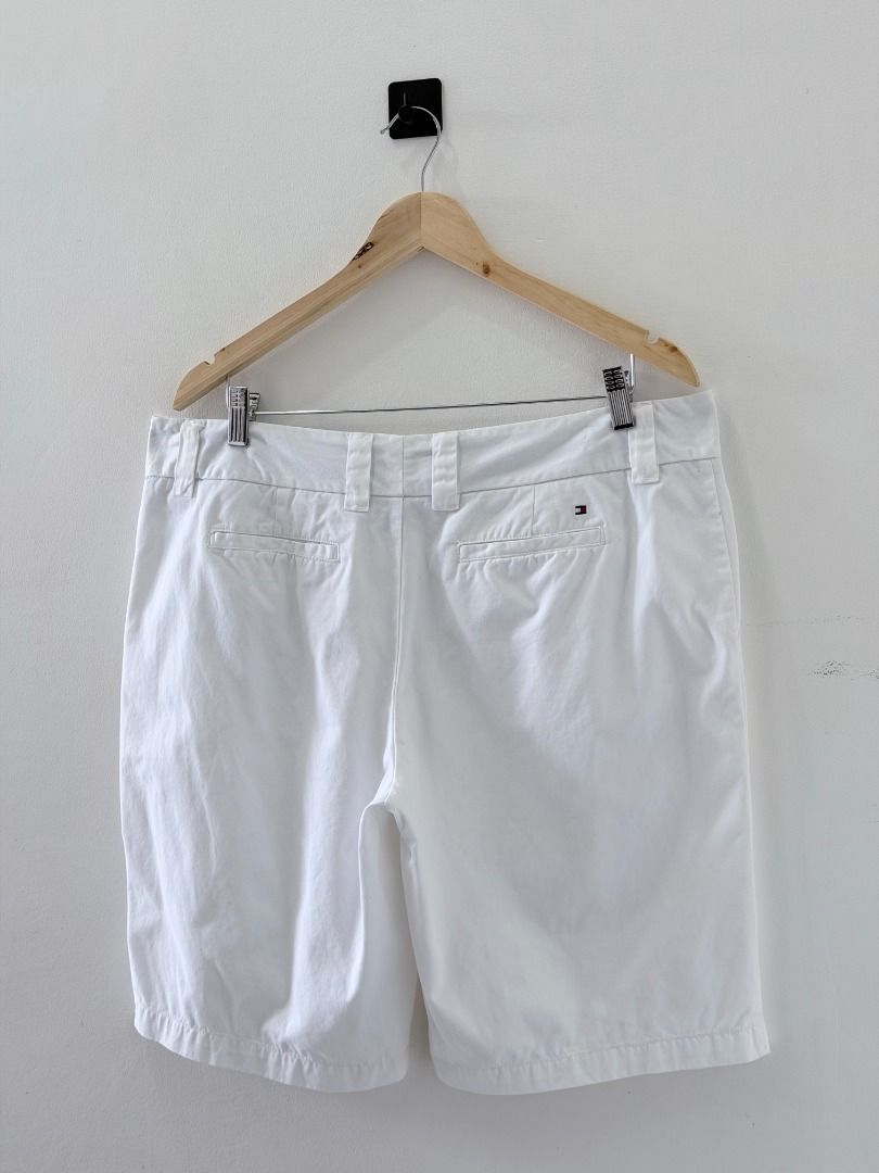 Tommy Hilfiger White Chino shorts (Category: Shorts) located in Cabanatuan. Submitted by argarments.ph (Listing ID 1452708319, Image 3). Description: Tagged: Size 14 Waist 36" | Length 20.5" | Leg opening 11.5" | Thigh 12.5" | Rise 12" Condition: Excellent Issue(s): Dot stain (unnoticeable).