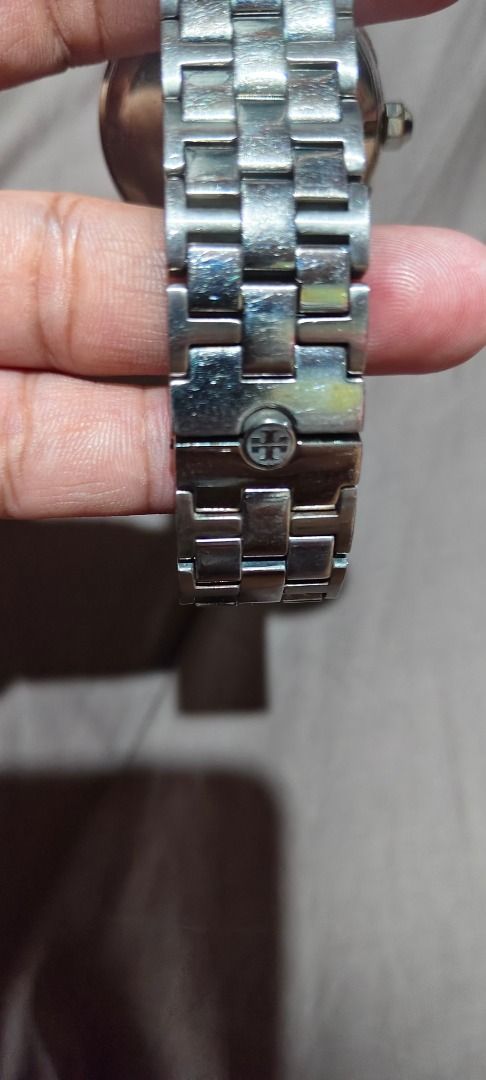 Tory Burch Chronograph Watch (Category: Luxury Watches) located in Legazpi City. Submitted by roxy420 (Listing ID 1452876093, Image 3). Description: - Authentic Tory Burch watch - Elegant white dial - Sleek silver band - Functional chronograph with sub-dials - Tory Burch logo detail on band - A chic and timeless piece.