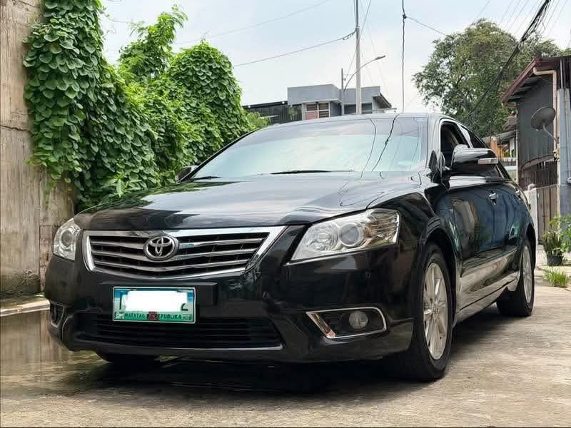 Toyota Camry G 2.4L Auto (Category: Used Cars) located in Manila. Submitted by quality_cars (Listing ID 1452764705, Image 3). Description: FOR SALE‼️ 2010 Toyota Camry G 2.4L Automatic Transmission All Stock 23T Mileage Only Casa Maintained 100% Guaranteed Original Mileage Smells Brandnew Xtreme Black All Original Paint Auto Climate Control A/C Power Retractable Sidemirrors Steering Audio Controls 3m Tint 4 New Tires Front And Rear Sensors 2 Keys