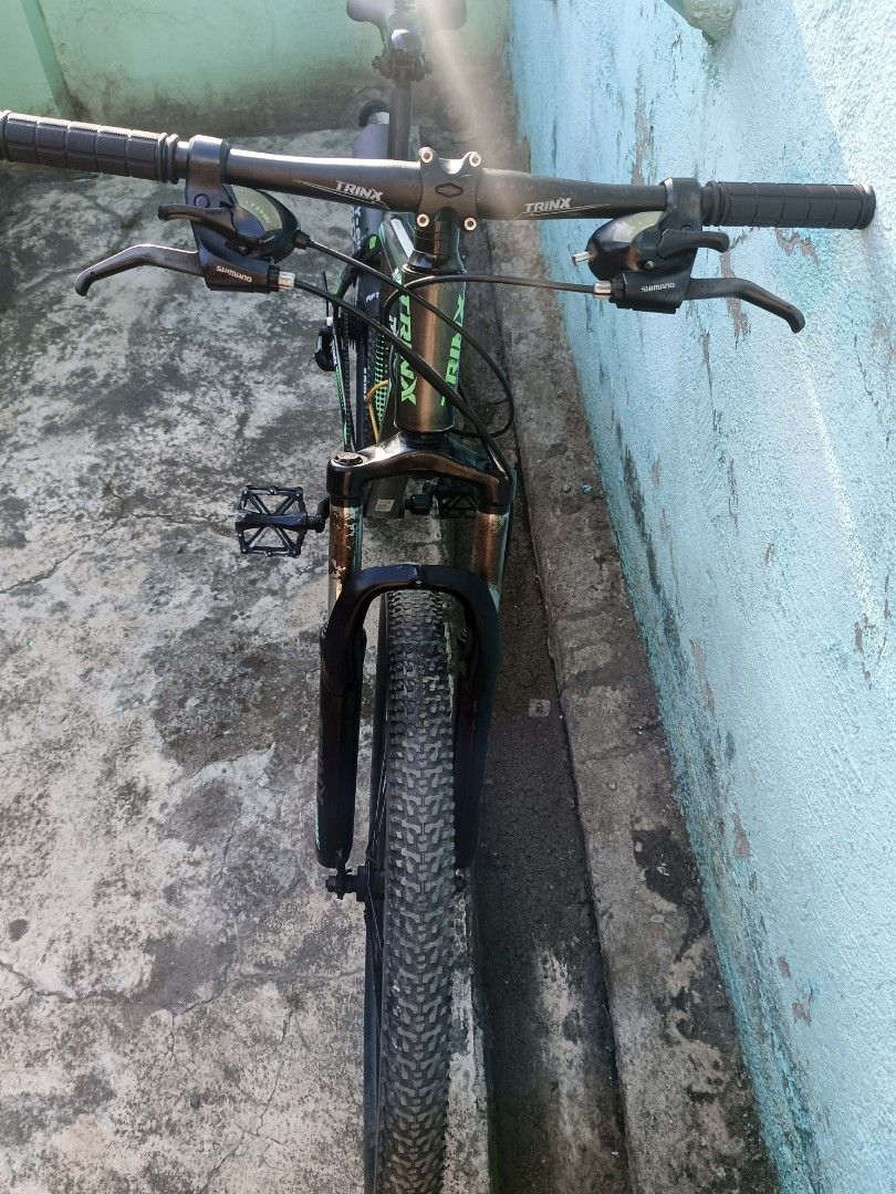 Trinx MTB M116 26er (Category: Bicycles) located in Manila. Submitted by janusalzo22136 (Listing ID 1452744693, Image 3). Description: Trinx M116 MTB 26er - 1x7 Speed - Alloy Frame - Mechanical Disc Brakes - Bottle Cage - Fenders - Kenda Tires Issues Konting bounce nalang yung shock Gulong pudpod na Price 3500 Negotiable Loc Binan Laguna.