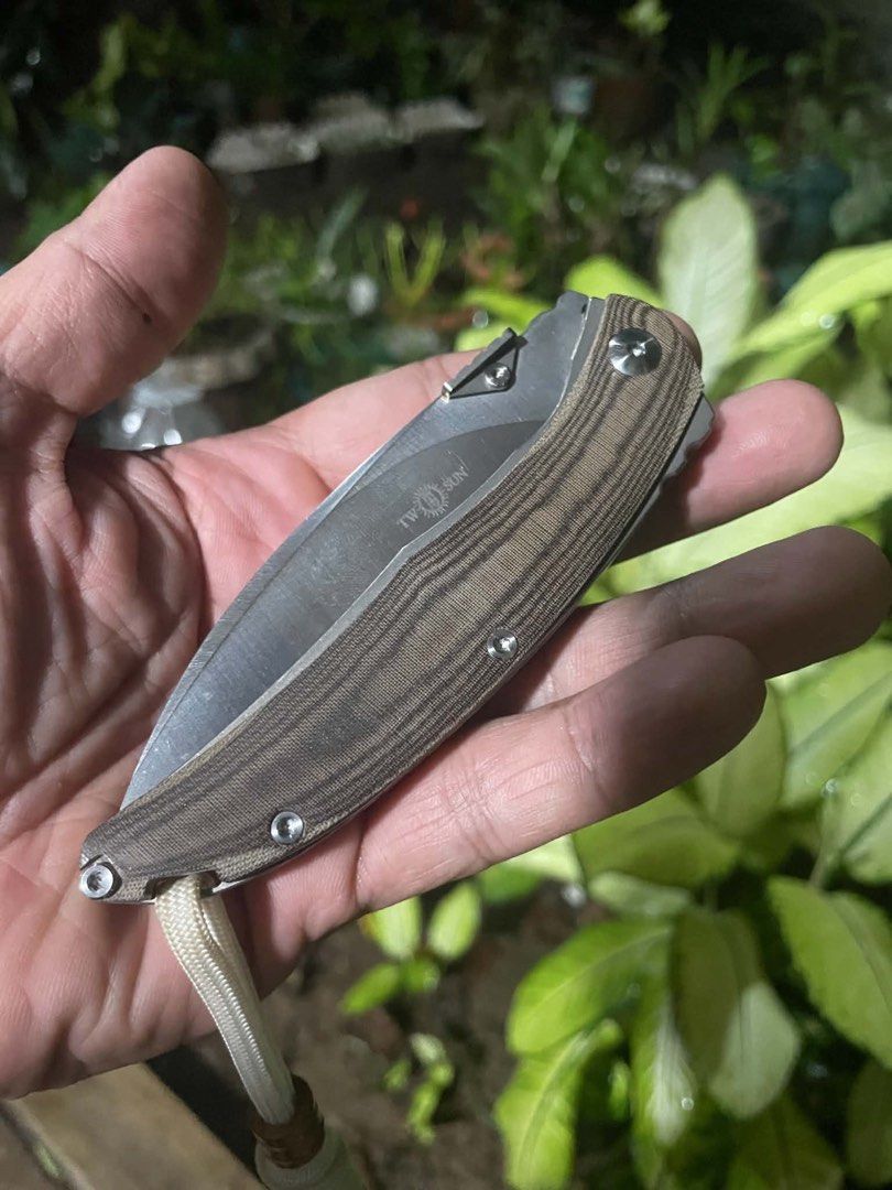 Two Sun Folding Knife (Category: Knives & Chopping Boards) located in Quezon City. Submitted by younik_finds (Listing ID 1452754035, Image 1). Description: Two Sun Folding Knife Origin: China Utility bushcraft .