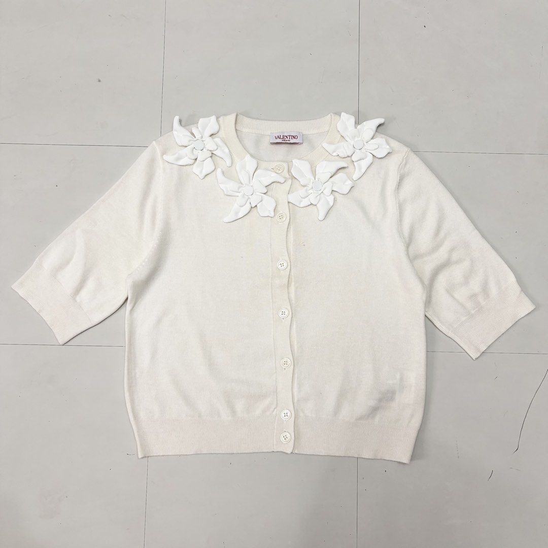 Valentino Knitted Top (Category: Blouses) located in Makati City. Submitted by bzspr (Listing ID 1452722253, Image 1). Description: Valentino Knitted Top Length 19.5 inches Width 17.5 inches.