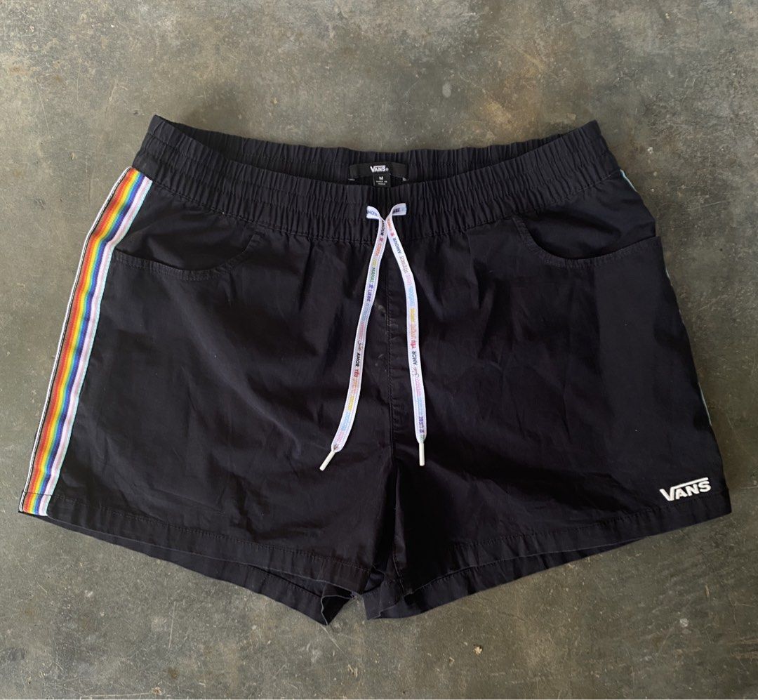 Vans Black Rainbow Stripe Shorts Size M (Category: Shorts) located in Manila. Submitted by guddthrift (Listing ID 1452751882, Image 1). Description: - Black Vans shorts - Rainbow stripe detail on the side - Elastic waistband with drawstring (drawstring has text) - Size M - Made in India - Front pockets.