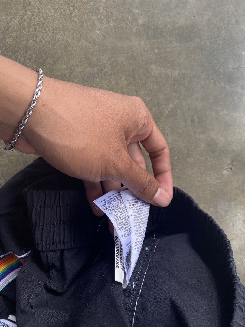 Vans Black Rainbow Stripe Shorts Size M (Category: Shorts) located in Manila. Submitted by guddthrift (Listing ID 1452751882, Image 3). Description: - Black Vans shorts - Rainbow stripe detail on the side - Elastic waistband with drawstring (drawstring has text) - Size M - Made in India - Front pockets.