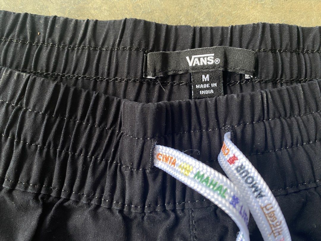 Vans Black Rainbow Stripe Shorts Size M (Category: Shorts) located in Manila. Submitted by guddthrift (Listing ID 1452751882, Image 2). Description: - Black Vans shorts - Rainbow stripe detail on the side - Elastic waistband with drawstring (drawstring has text) - Size M - Made in India - Front pockets.