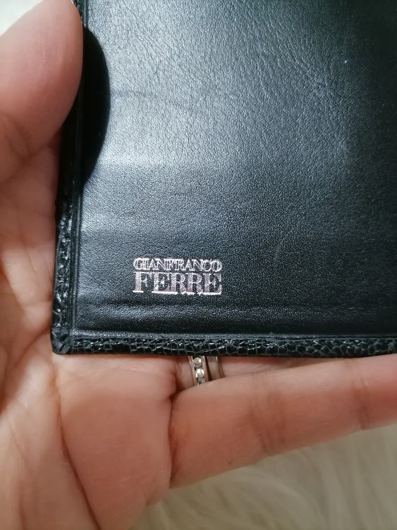 Vintage Gianfranco Ferre Trifold Wallet (Category: Luxury Bags & Wallets) located in Butuan. Submitted by az-branded.items (Listing ID 1452875504, Image 3). Description: Black trifold wallet featuring a distinctive animal textured finish Manufactured in Italy During the 80's & 90's In great condition no flaws.