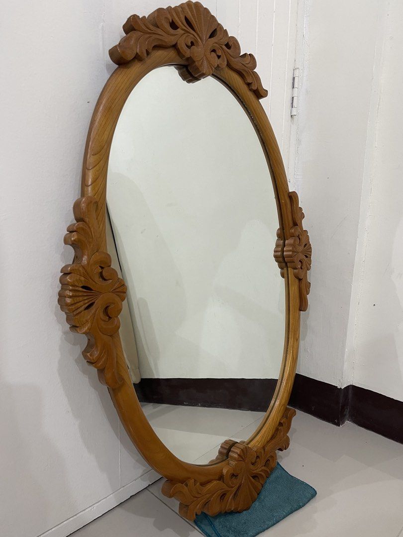 wall wooden carved mirror (Category: Other Home Furniture) located in Manila. Submitted by dstrangerthings (Listing ID 1452841784, Image 1). Description: **very nice po at malaki in person **mabigat po ito **manage your expectations po meron kunti damage sa wood shown sa photo but doesn’t affect the total aesthetic. ✅Open to offers 📍Santa rosa laguna.