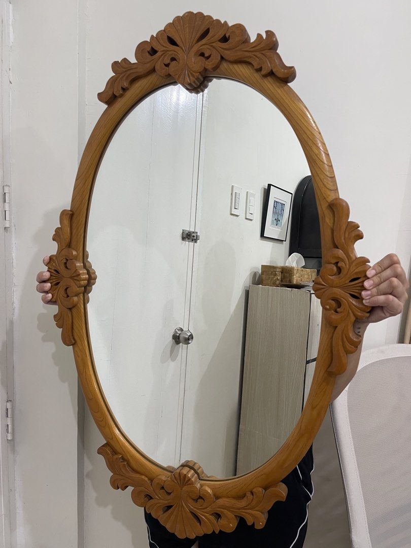 wall wooden carved mirror (Category: Other Home Furniture) located in Manila. Submitted by dstrangerthings (Listing ID 1452841784, Image 2). Description: **very nice po at malaki in person **mabigat po ito **manage your expectations po meron kunti damage sa wood shown sa photo but doesn’t affect the total aesthetic. ✅Open to offers 📍Santa rosa laguna.