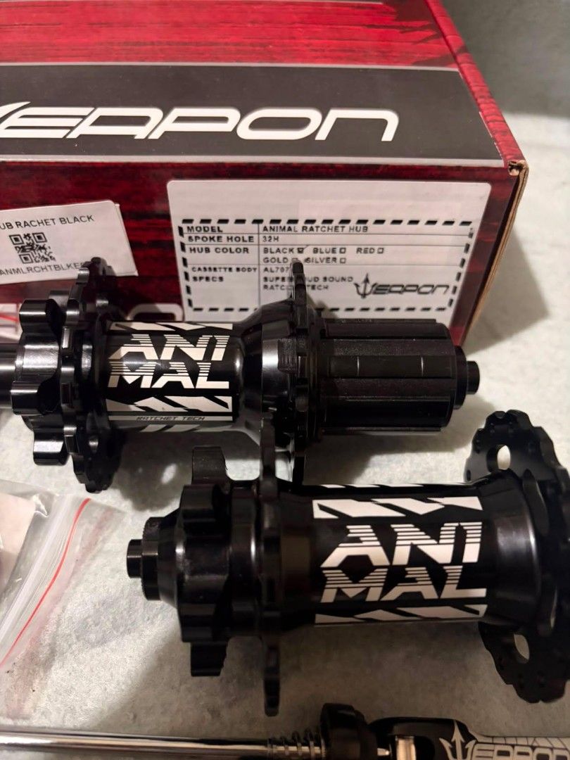Weapon Animal Ratchet Hubs Black (Category: Bicycles) located in Manila. Submitted by drksknmark (Listing ID 1452852137, Image 2). Description: - Weapon Animal Ratchet Hubs (Black) - Front Hub: 15x100mm - Rear Hub: 12x142mm - Includes Quick Release Skewers - Perfect for bike upgrades - Please check photos for detailed condition.