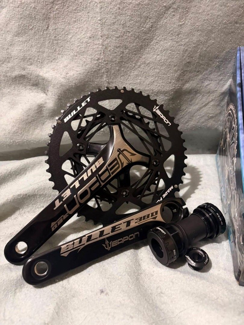 Weapon Bullet 380 Crankset with Bottom Bracket (Category: Bicycles) located in Manila. Submitted by drksknmark (Listing ID 1452852045, Image 2). Description: - Weapon Bullet 380 Crankset - Color: All Black - Includes: Crank Arms, Chainring, Bottom Bracket - Condition: Brand New in Original Packaging - Benefit: Great upgrade for your bike - Ready for your next ride!.