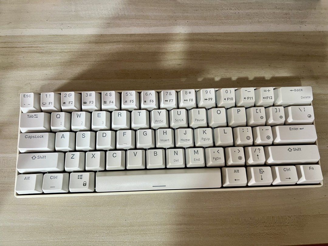 White 60% Mechanical Keyboard (Category: Computer Keyboard) located in Manila. Submitted by solana.1026 (Listing ID 1452746005, Image 1). Description: Royal Kludge RK61 Mechanical Keyboard - Brown Hot-swappable switches - RGB Edition - Works on cable or battery (Bluetooth/2.4 Hz Receiver) - White 60% mechanical keyboard - Compact layout, perfect for saving desk space - Includes original box and accessories.