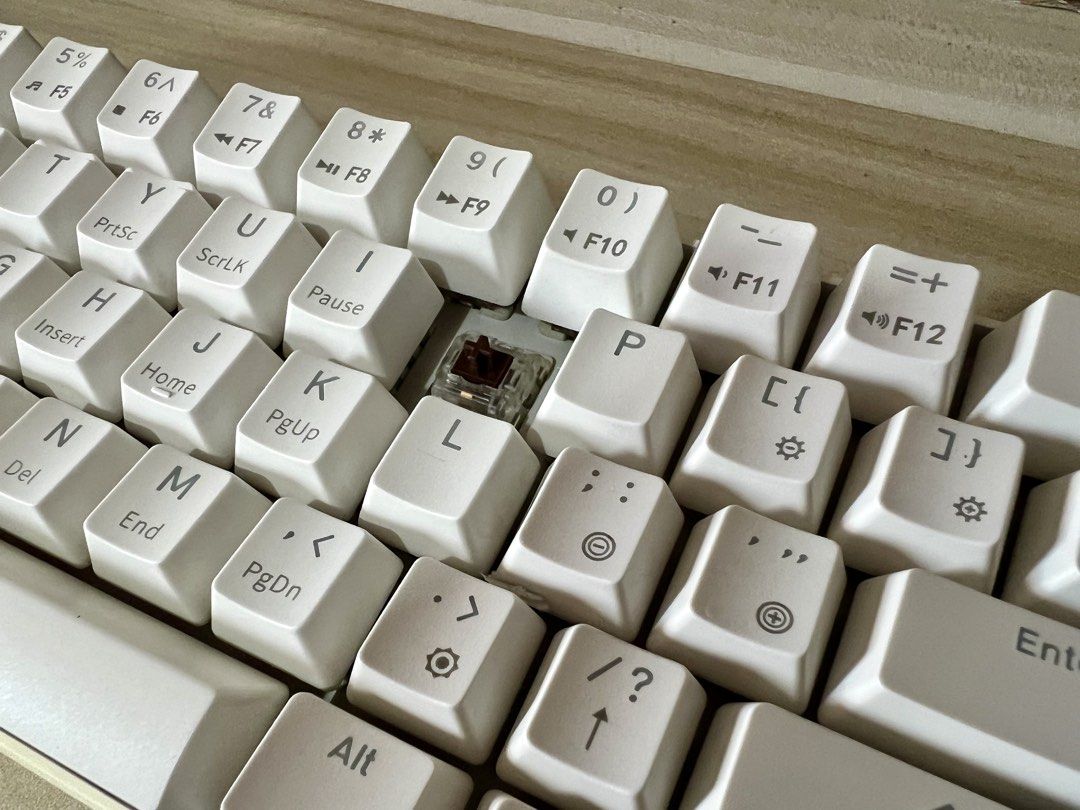White 60% Mechanical Keyboard (Category: Computer Keyboard) located in Manila. Submitted by solana.1026 (Listing ID 1452746005, Image 3). Description: Royal Kludge RK61 Mechanical Keyboard - Brown Hot-swappable switches - RGB Edition - Works on cable or battery (Bluetooth/2.4 Hz Receiver) - White 60% mechanical keyboard - Compact layout, perfect for saving desk space - Includes original box and accessories.