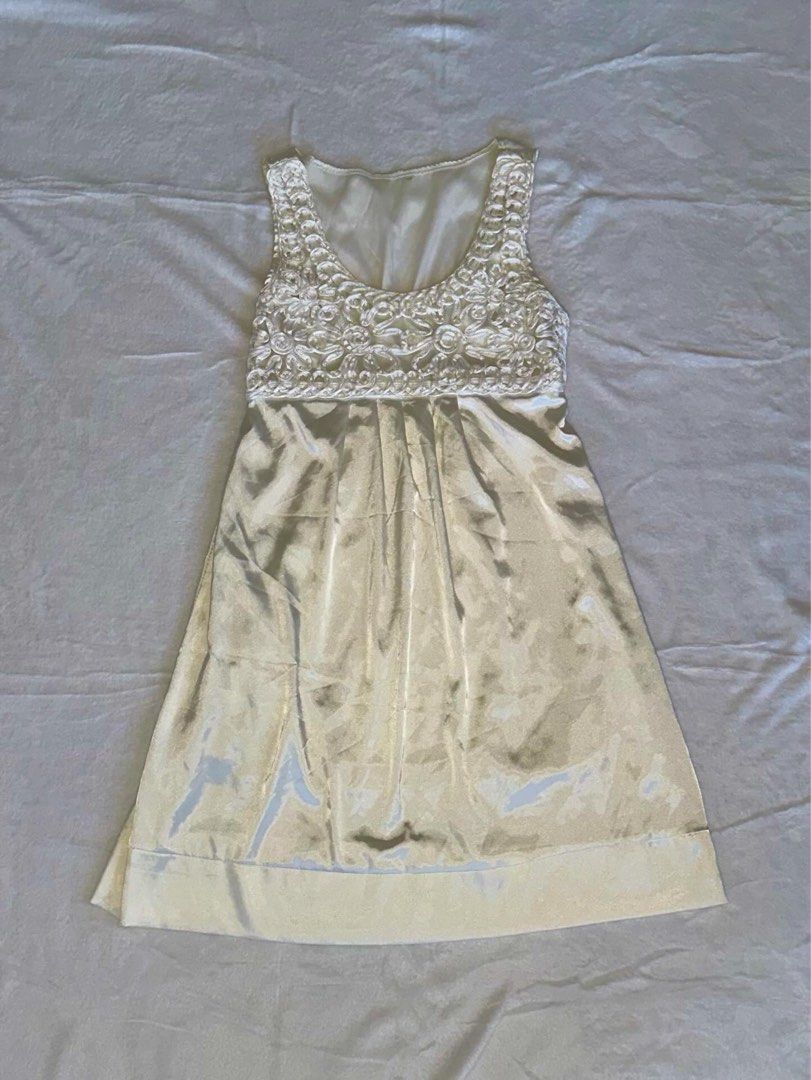 white/cream satin dress (Category: Dresses) located in Las Pinas. Submitted by cccurations (Listing ID 1452714284, Image 1). Description: 🔖 white/cream satin dress 🪡 length: 34” 🪡 shoulder to pit: 8.5” 🪡 bust: 30” 🪡 waist: 32” 🪡 gartered on the back! 🪡 pretty floral details on the bust area! 🪡 angelic type of dress! so pretty 🪡 will personally keep if not sold 🪽 🔖 ₱450 🔖 comment “mine” to get the item! 🔖 comment “next” if you’re will
