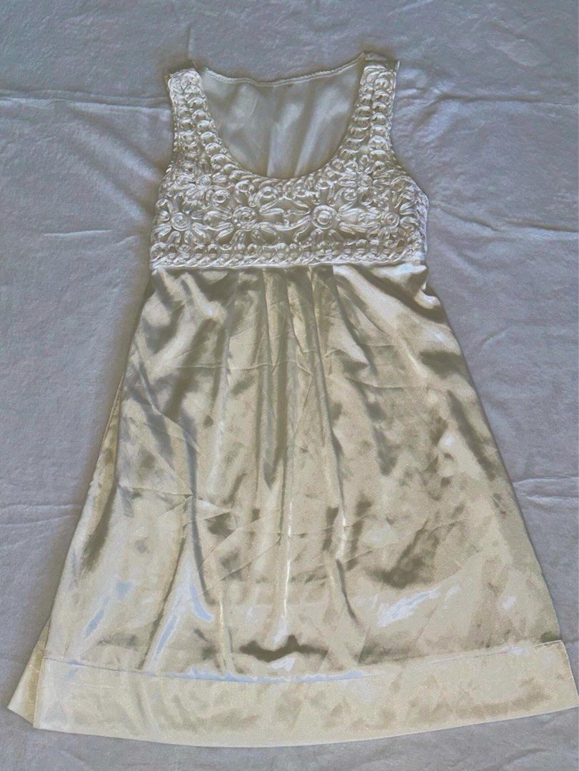 white/cream satin dress (Category: Dresses) located in Las Pinas. Submitted by cccurations (Listing ID 1452714284, Image 2). Description: 🔖 white/cream satin dress 🪡 length: 34” 🪡 shoulder to pit: 8.5” 🪡 bust: 30” 🪡 waist: 32” 🪡 gartered on the back! 🪡 pretty floral details on the bust area! 🪡 angelic type of dress! so pretty 🪡 will personally keep if not sold 🪽 🔖 ₱450 🔖 comment “mine” to get the item! 🔖 comment “next” if you’re will