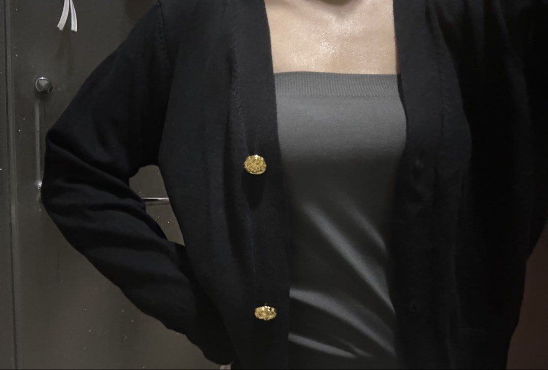 Woman Black Cardigan (Category: Others Tops) located in Manila. Submitted by 0844a636fcbbe31a73e1ff4334c7e3 (Listing ID 1452779881, Image 1). Description: PRICE NEGOTIABLE—JUST CLICK "MAKE OFFER"! 🪻 Looks better in person 🪻 Black Cardigan 🪻 Button details 🪻 Long sleeves 🪻 Unique design 🪻 Original Price: 999 🍀Location: Pasay Metro Manila 🍀Payment first policy (check shop reviews for legitimacy check🩵) 🪻Pay via GCash 🍀Product will only b