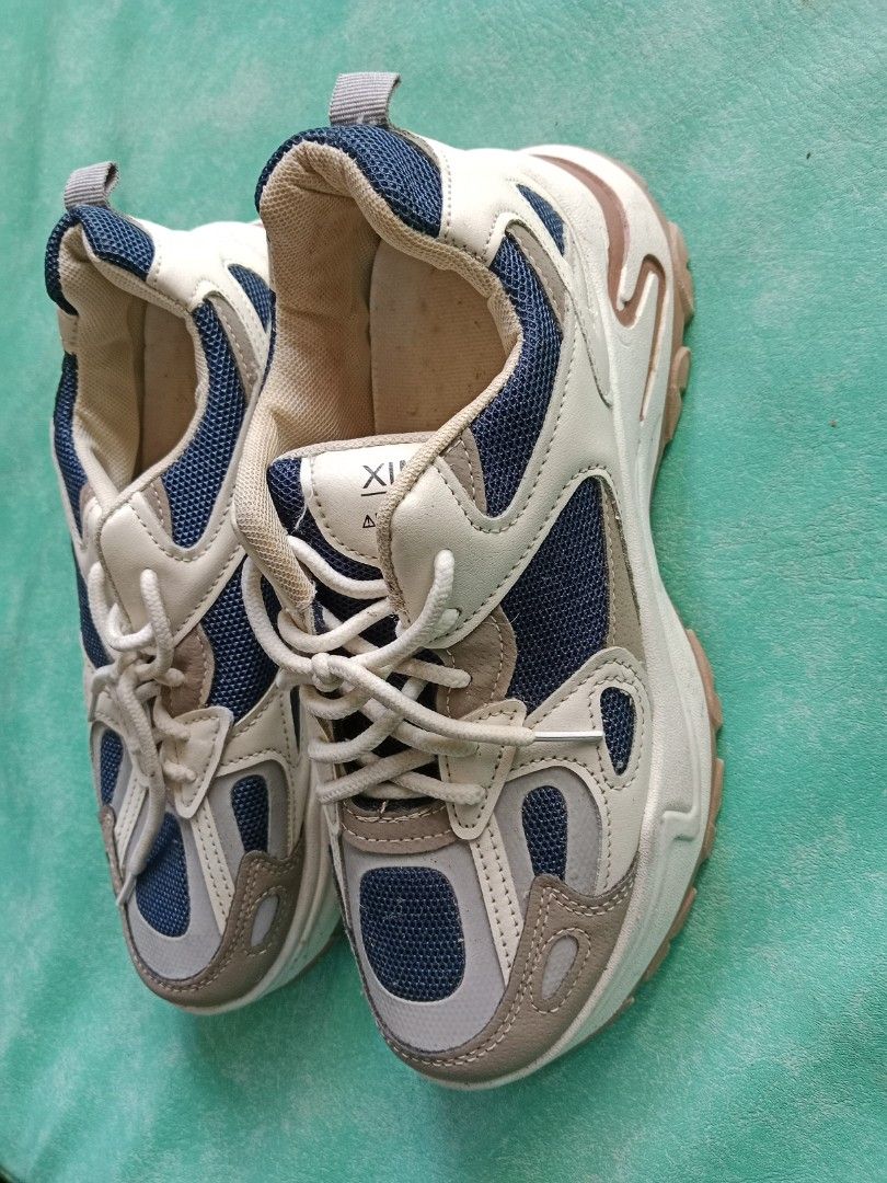XIMO Chunky Sneakers White Blue Grey (Category: Sneakers) located in Manila. Submitted by narsonlineexpression (Listing ID 1452713053, Image 2). Description: - Chunky sneaker design - Colorway: White, blue, and grey panels - Secure lace-up closure - Comfortable for everyday wear - Ideal for walking and casual outings - Please check photos for condition details.