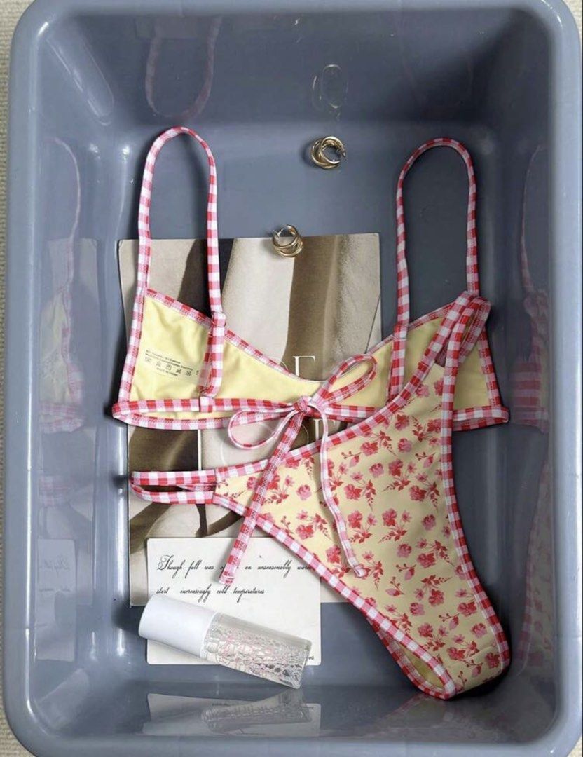 Yellow Floral Gingham Bikini Set (Category: Bikinis & Swimsuits) located in Pasig City. Submitted by ag_cleanup (Listing ID 1452821422, Image 2). Description: NEVER USED! Does not cit me.