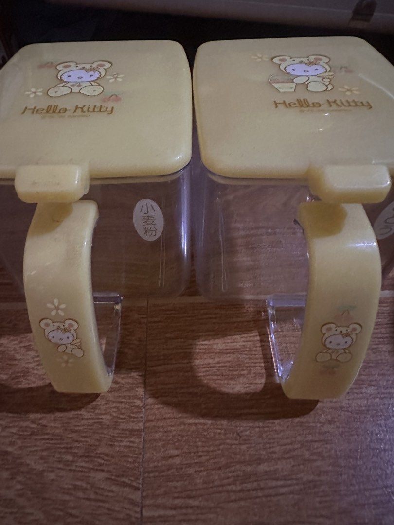 2x Yellow Hello Kitty Storage Containers with Handles vintage (Category: Storage Boxes & Baskets) located in Legazpi City. Submitted by lgponlineshop (Listing ID 1453003726, Image 2). Description: - Set of 2 yellow Kitty storage containers - Features cute bear design - Includes handles for easy carrying - Ideal for organizing small items in the kitchen or on your desk - Secure lid closure - Perfect for Kitty collectors and fans.