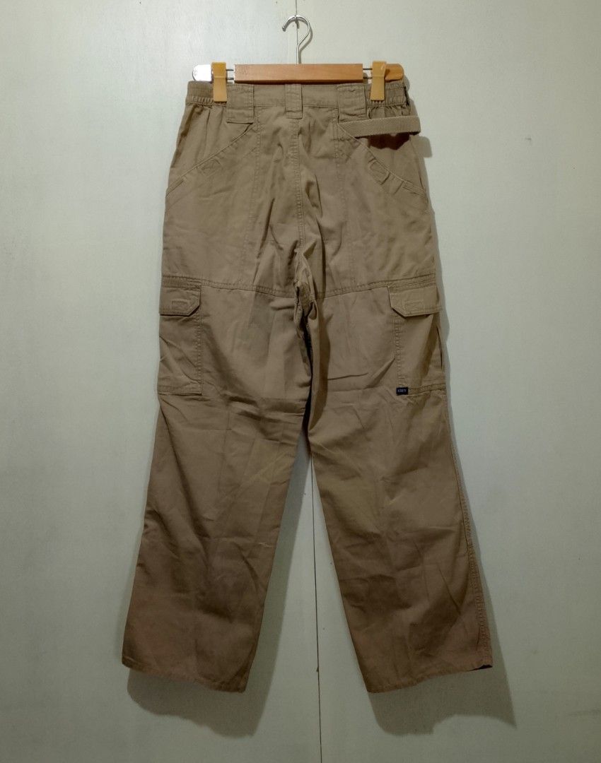 5.11 Tactical Cargo Pants Khaki Men's Size (Category: Jeans) located in Manila. Submitted by moisky18 (Listing ID 1452958986, Image 2). Description: - Brand: 5.11 Tactical - Color: Khaki - Style: Cargo Pants - Features: Multiple pockets for ample storage - Material: Durable, suitable for outdoor activities and work - Comfort: Elastic waistband - Includes: Belt - Condition: Ready for a new owner.