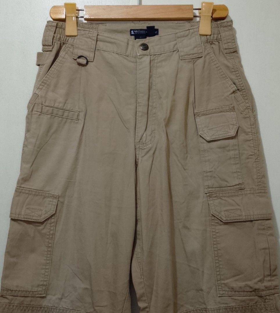 5.11 Tactical Cargo Pants Khaki Men's Size (Category: Jeans) located in Manila. Submitted by moisky18 (Listing ID 1452958986, Image 3). Description: - Brand: 5.11 Tactical - Color: Khaki - Style: Cargo Pants - Features: Multiple pockets for ample storage - Material: Durable, suitable for outdoor activities and work - Comfort: Elastic waistband - Includes: Belt - Condition: Ready for a new owner.
