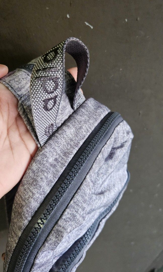 Adidas Essentials 2-Way Convertible Mini Backpack / Sling Bag (Heather Gray) (Category: Backpacks) located in Cavite. Submitted by aiomie.0021 (Listing ID 1452885500, Image 3). Description: *Brand: Adidas *Condition: Like New, no flaws, no stains, no scuffs, and zero interior lining issues. Zippers glide perfectly. Used once only. *Color: Heather Jersey Gray with Rose Gold hardware *Style: Convertible 2-Way (Can be styled as a standard mini backp