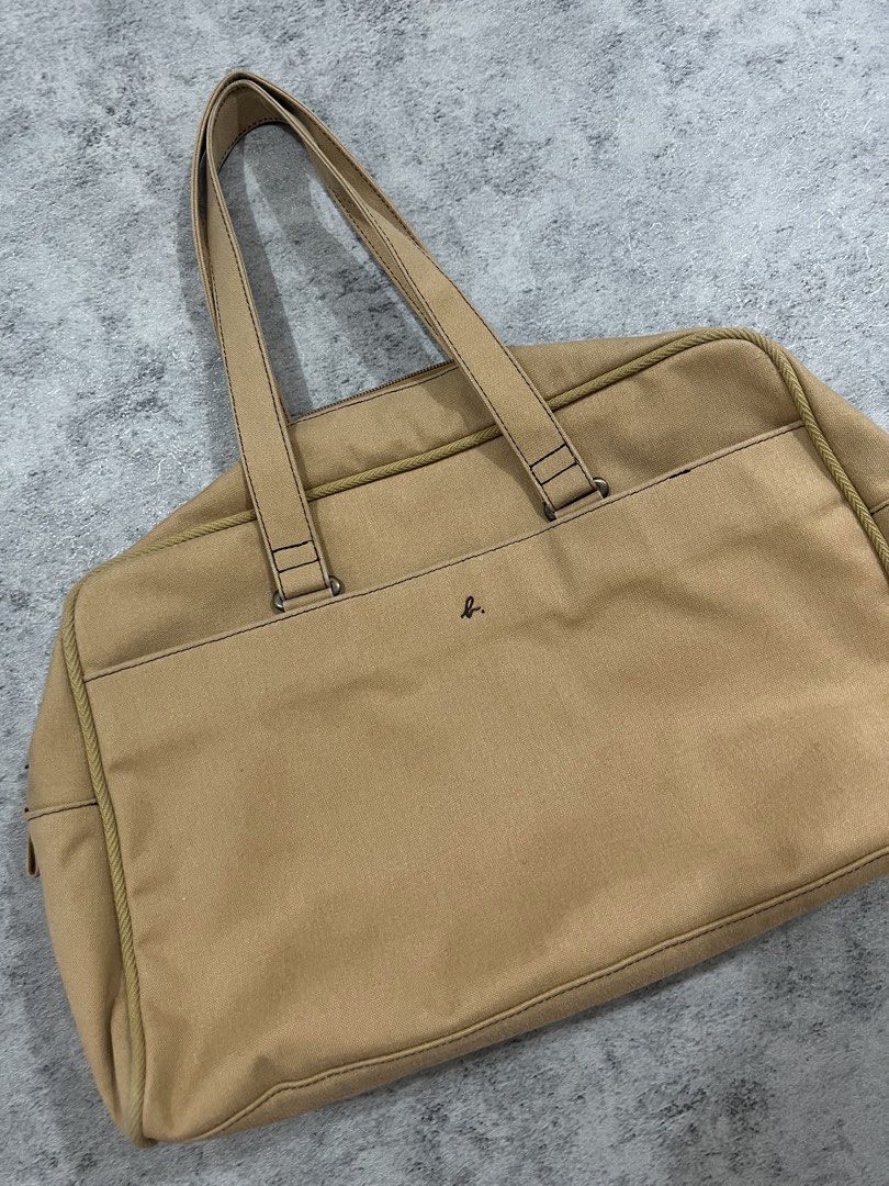 agnes b. voyage canvas tote bag (Category: Tote Bags) located in Bulacan. Submitted by modamuze (Listing ID 1452943581, Image 2). Description: a4 size, fits 13” laptop large capacity durable dimensions: width: 15” height: 10” base: 4” strap length: 11” .