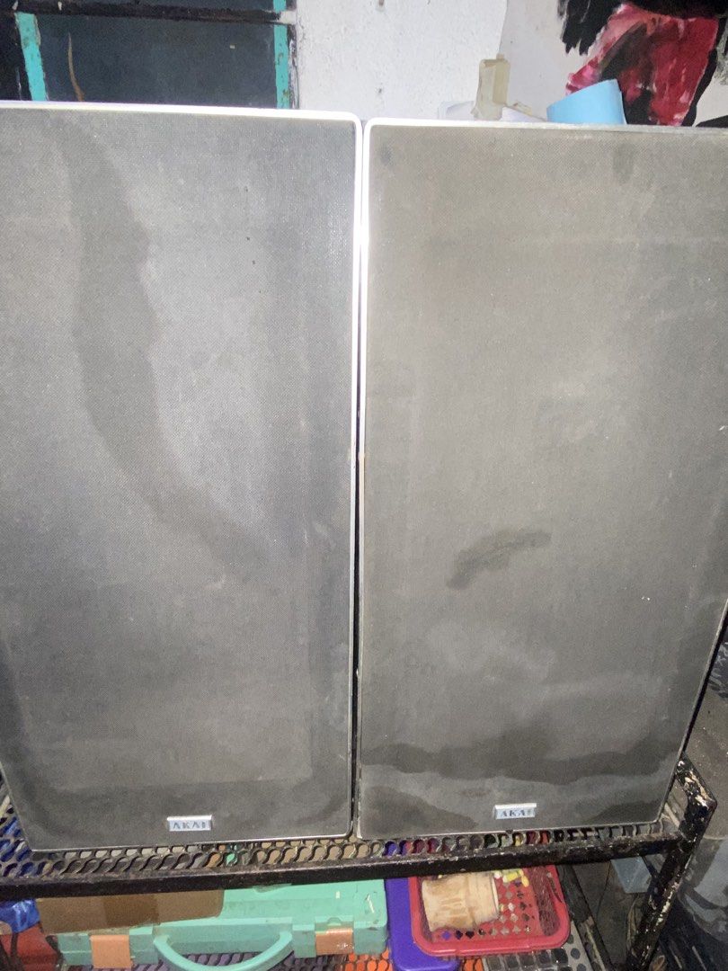 AKAI Speakers Pair (Category: Soundbars, Speakers & Amplifiers) located in Manila. Submitted by cosmiccloud-adf7 (Listing ID 1452976841, Image 2). Description: - Pair of AKAI speakers - Color: Black with grey speaker covers - Condition: Used, with scuffs and marks on cabinets - Ideal for home audio setups - Tested and confirmed working - Pickup or lalamove 10" woofer 8omhs .