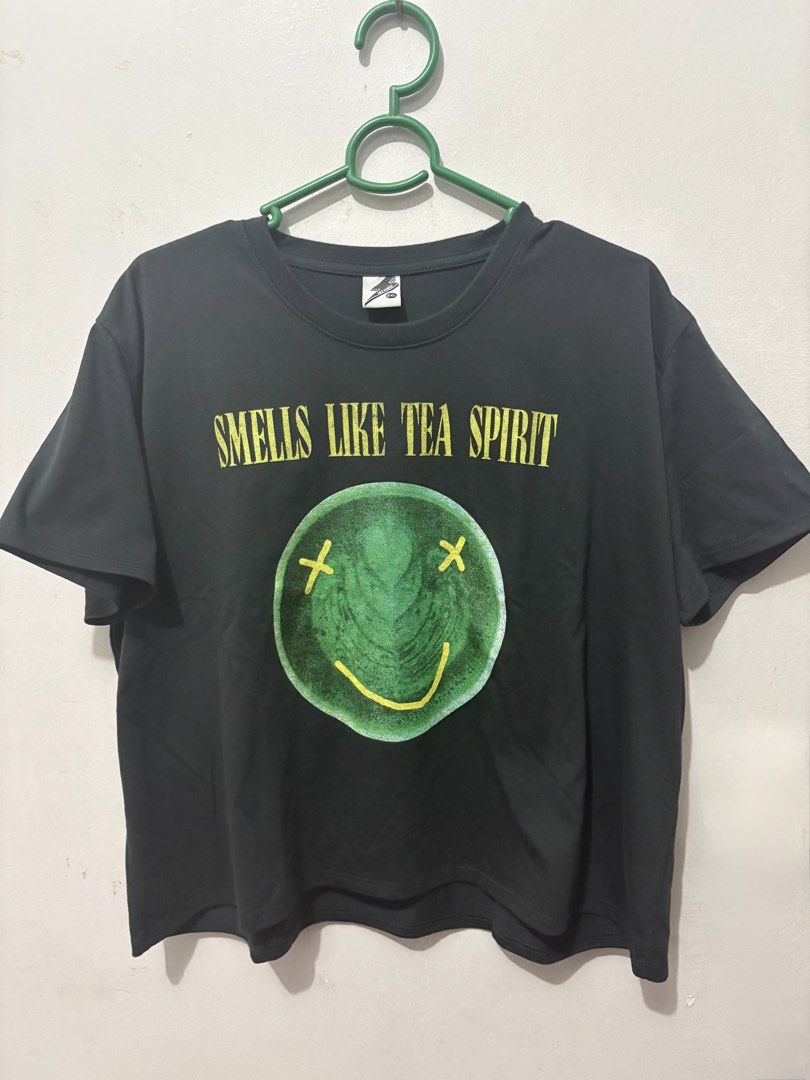 ARTWORK Nirvana Smells Like Tea Spirit Crop Top (Category: Shirts) located in Apalit. Submitted by trishy.stuff (Listing ID 1452966512, Image 1). Description: - wear once - color: charcoal black - dims: length- 21" width- 22.5" - original price: 699 - selling price: 350 📍 Pampanga .