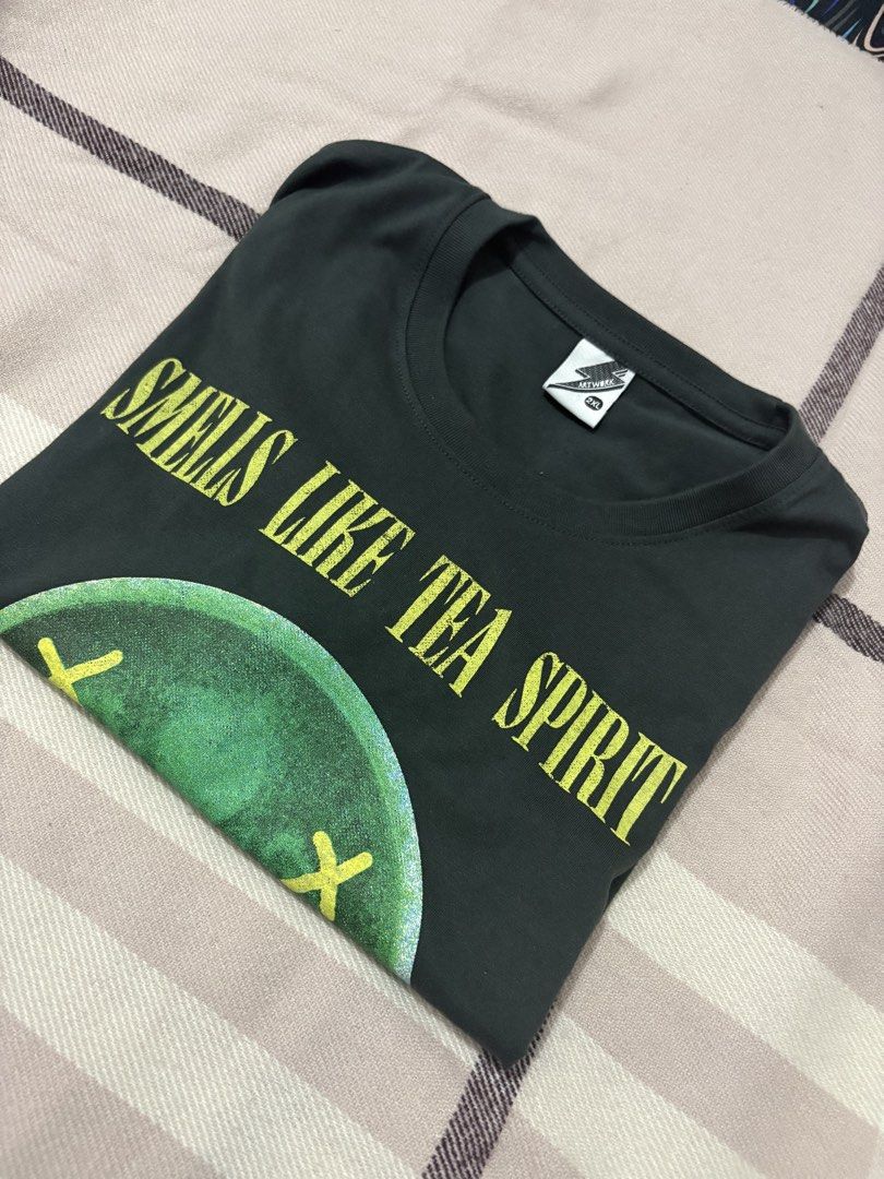 ARTWORK Nirvana Smells Like Tea Spirit Crop Top (Category: Shirts) located in Apalit. Submitted by trishy.stuff (Listing ID 1452966512, Image 2). Description: - wear once - color: charcoal black - dims: length- 21" width- 22.5" - original price: 699 - selling price: 350 📍 Pampanga .