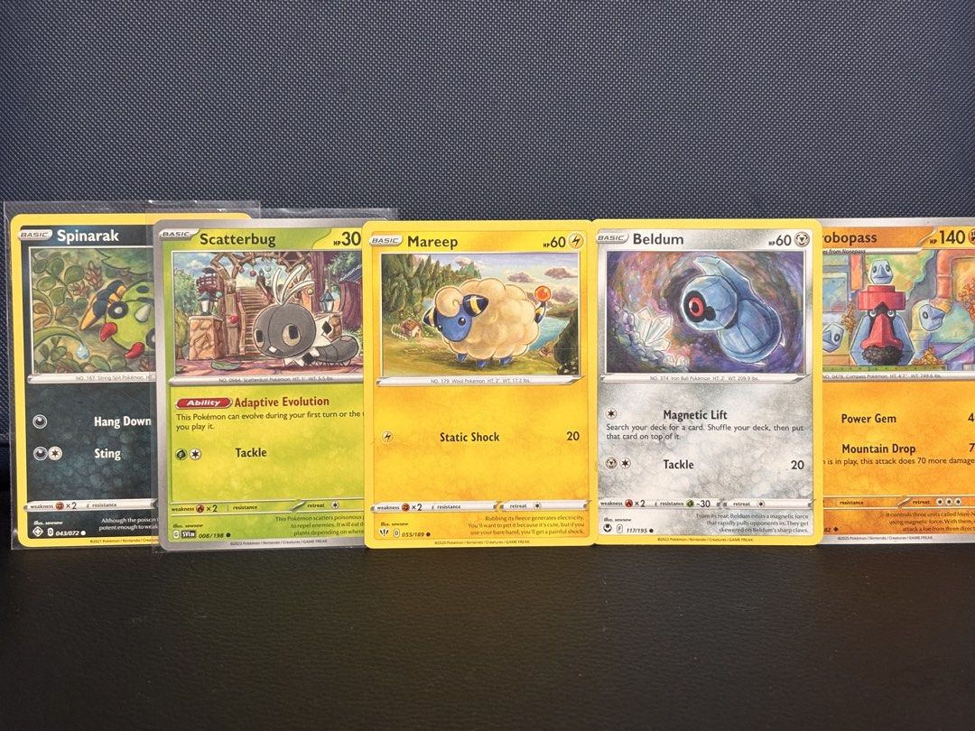 Assorted characters Assorted card (Category: Raw Cards) located in Singapore. Submitted by soapie13 (Listing ID 1453045595, Image 1). Description: $1.50 EACH Spinarak, Scatterbug, Mareep, Beldum, Obopass - Ideal for collectors and players.