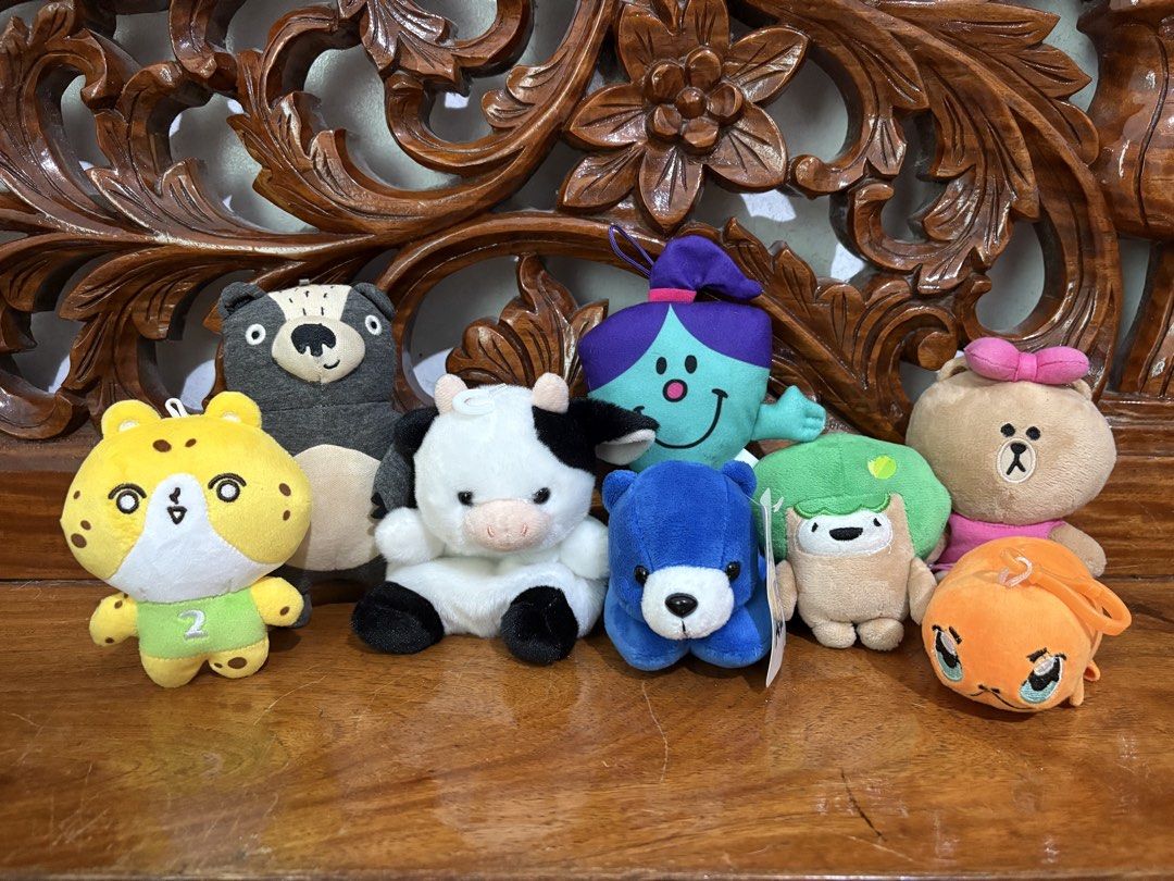 Assorted Cute Plushies - Bear, Cow, Leopard, and More! (Category: Plushies & Soft Toys) located in Quezon City. Submitted by rxyel (Listing ID 1452967294, Image 1). Description: - Adorable plush toy collection available! - Includes: Badger, Yellow Leopard (with green shirt), Black & White Cow, Blue Bear, Character with Purple Hat, Brown Bear (with pink bow), Tree-like Character, Orange Creature. - All plushies are in good, pre-loved condition. - 