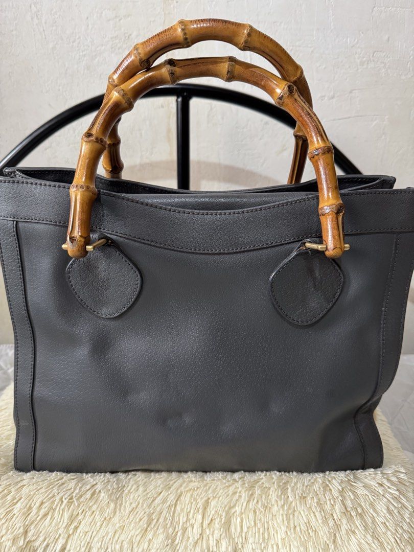 Authentic Gucci Diana Bamboo (Category: Luxury Bags & Wallets) located in Danao, Cebu. Submitted by jojie.1983 (Listing ID 1452894063, Image 1). Description: - Stylish grey leather tote bag - Features elegant bamboo handles - Beautiful textured leather - Ample interior space for essentials - Versatile for work or casual outings.