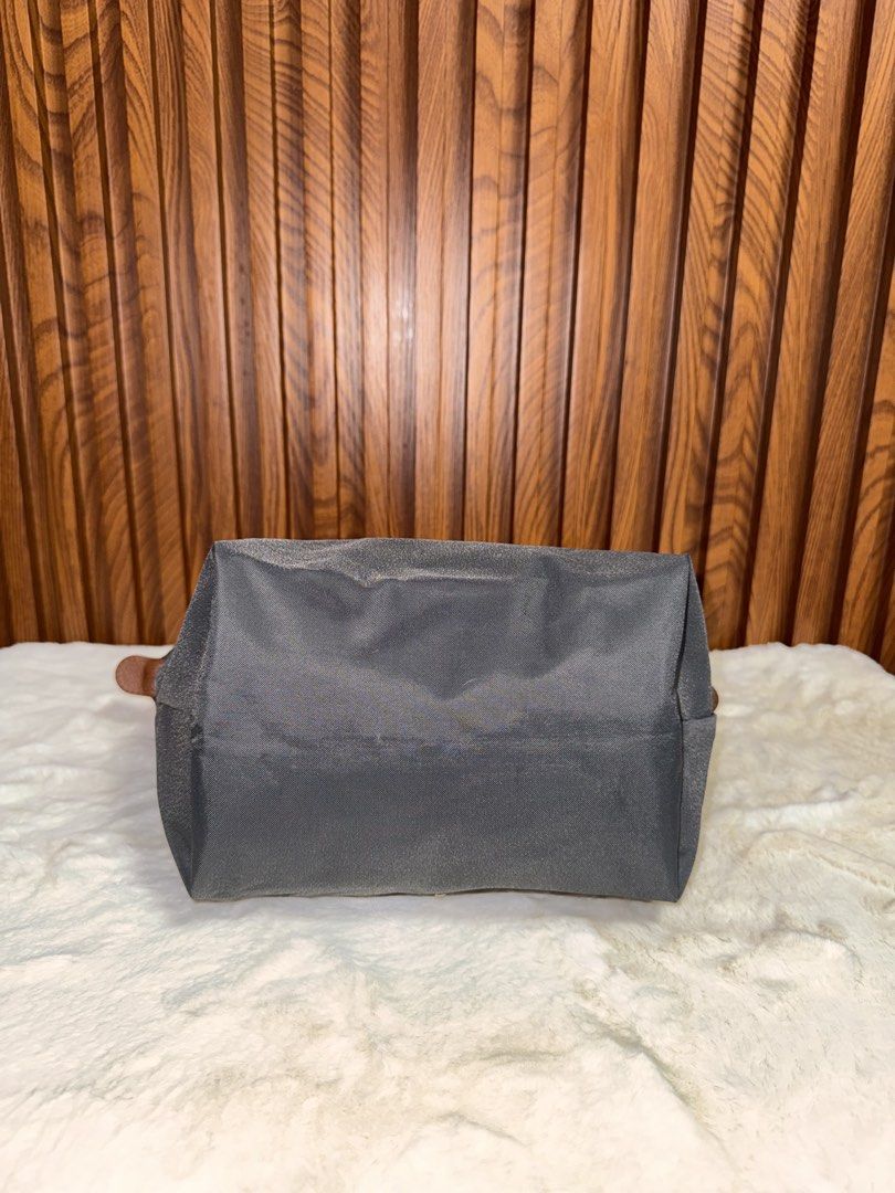Authentic Longchamp Small Top Handle Bag (Category: Luxury Bags & Wallets) located in Subic. Submitted by luxshoppe88 (Listing ID 1452884806, Image 3). Description: - Stylish gray nylon and brown leather material top hndle tote bag - Durable nylon material - Spacious interior - Classic and versatile design mode of payment : bpi and gcash shipping will be done once payment confirm.. or the next day. HAPPY SHOPPING!! T-H-A-N-K Y-O-U! 😊 .