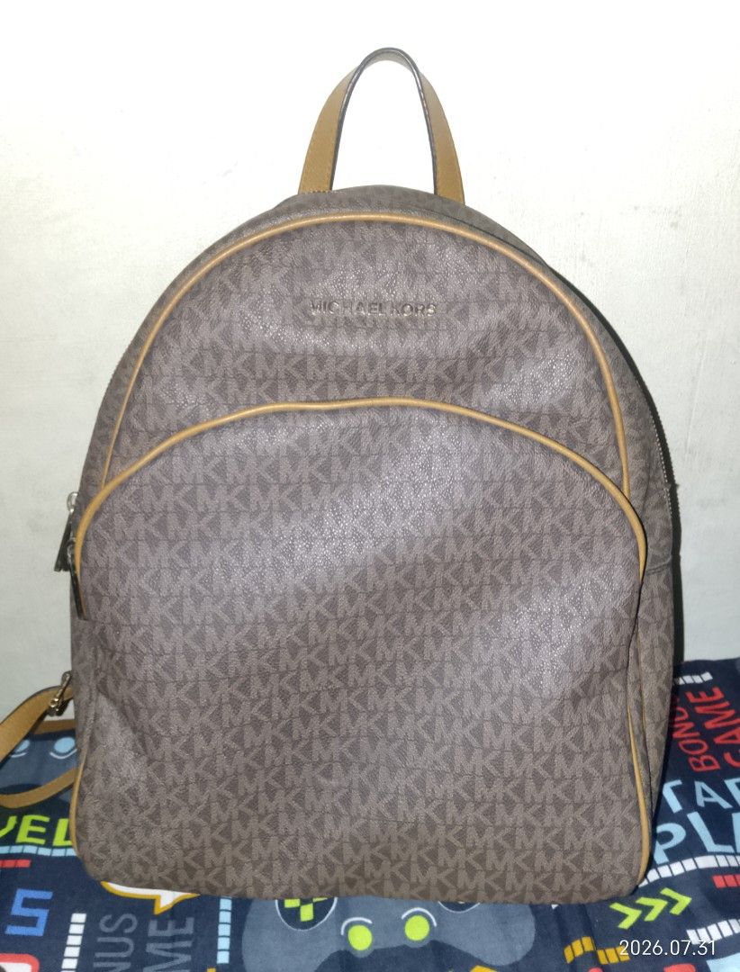 Authentic michael kors MK backpack preloved (Category: Luxury Bags & Wallets) located in Manila. Submitted by candy34_90 (Listing ID 1449885361, Image 3). Description: bag only, wlang sira. large size badly need funds dasma area.