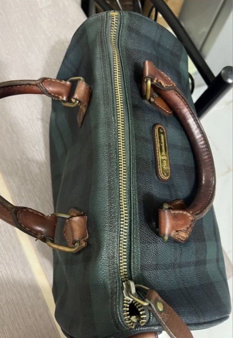Authentic Polo Ralph Lauren Plaid Boston Bag (Category: Luxury Bags & Wallets) located in Marikina City. Submitted by introvertshopper (Listing ID 1453017817, Image 3). Description: Classic Polo Ralph Lauren Boston Bag - Green and black plaid pattern - Genuine leather handles and trim - Secure zipper closure - Ideal size for everyday essentials - Minor signs of wear on leather, consistent with use - Bought in Japan .
