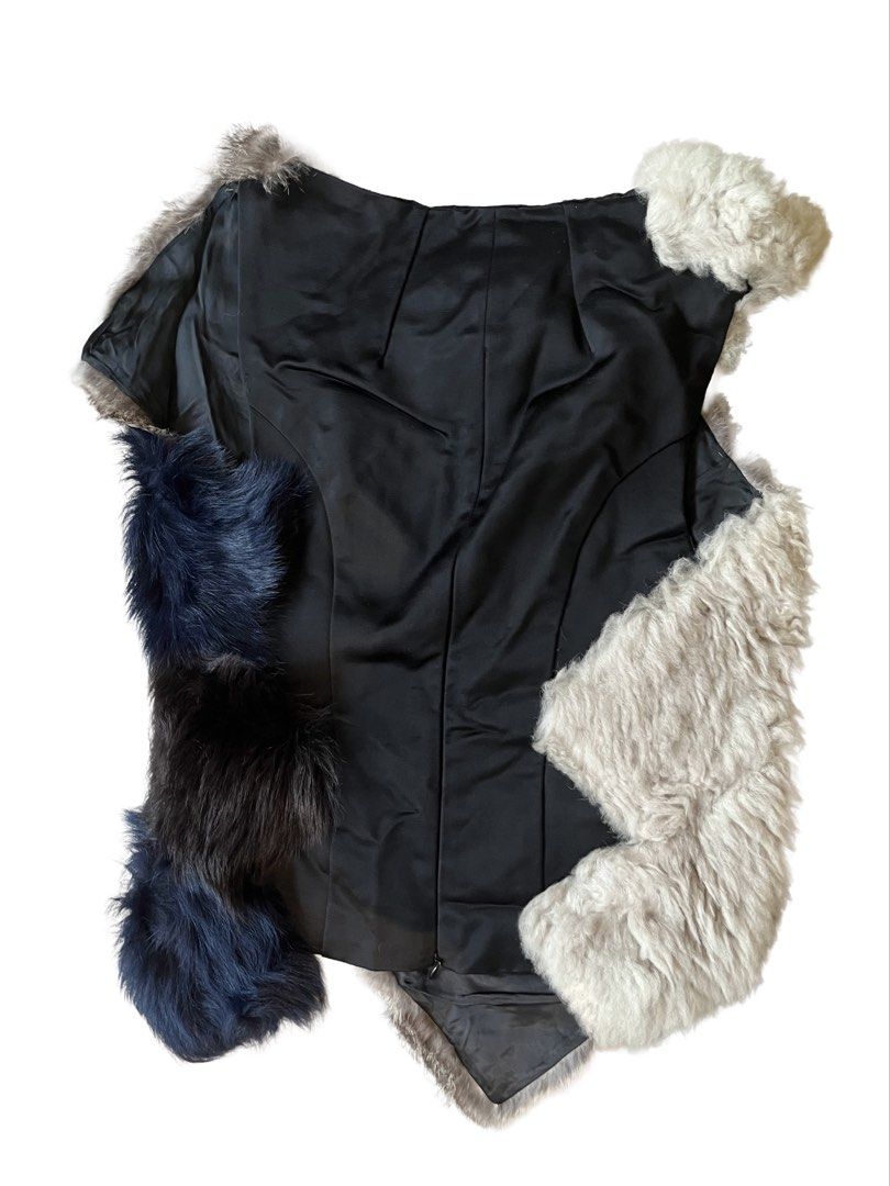 AW15 Maison Martin Margiela Patchwork Fur Vest (Category: Others Tops) located in Makati City. Submitted by slavetorave (Listing ID 1452896752, Image 2). Description: - AW15 Maison Margiela patchwork furvest - Unique patchwork design with various furs - Black satin lining - Made in Italy - Size: 40IT - Perfect statement piece for any outfit.